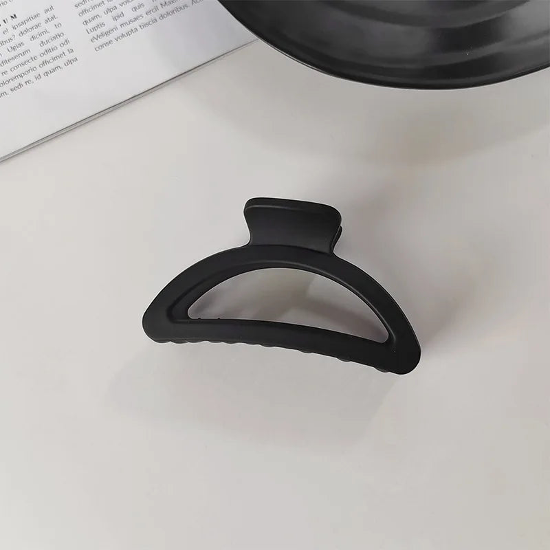 Elegante schwarze Haarspange mit geometrischem Design für Damen