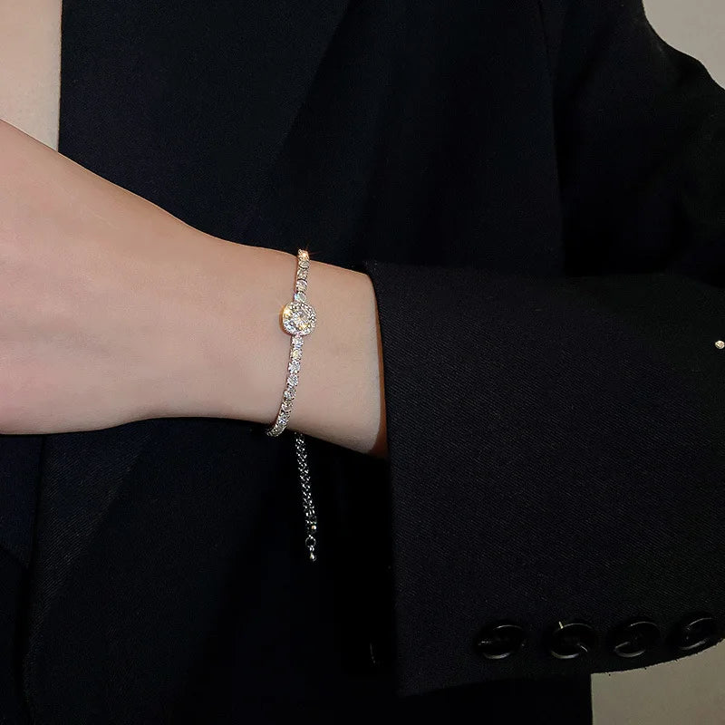 Verstellbares Damen Armband mit funkelnden Zirkonia, 18K Goldoptik